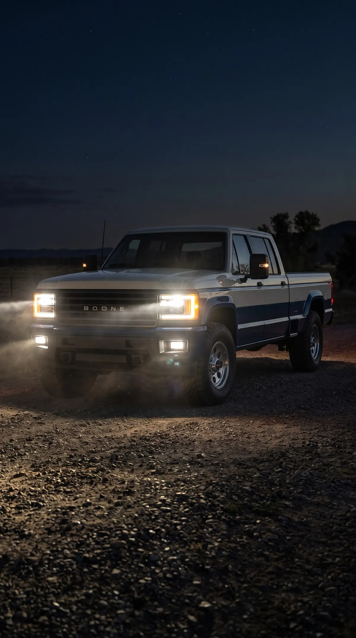 Boone Crew Cab at night with its headlights on